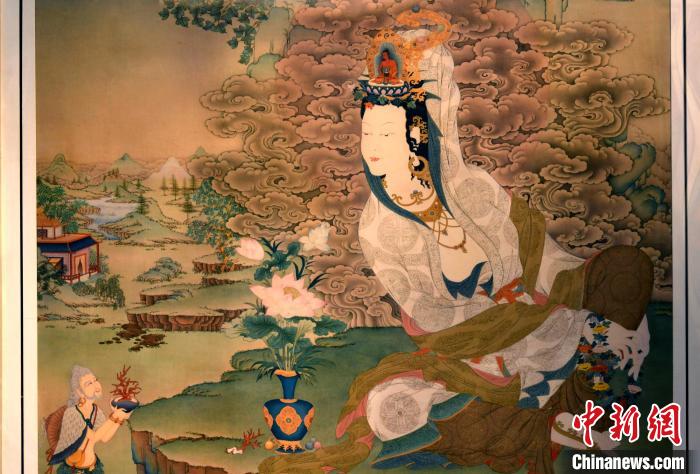 圖為5月16日，展覽中新創(chuàng)唐卡作品《靜息觀音》(局部)。　李林 攝